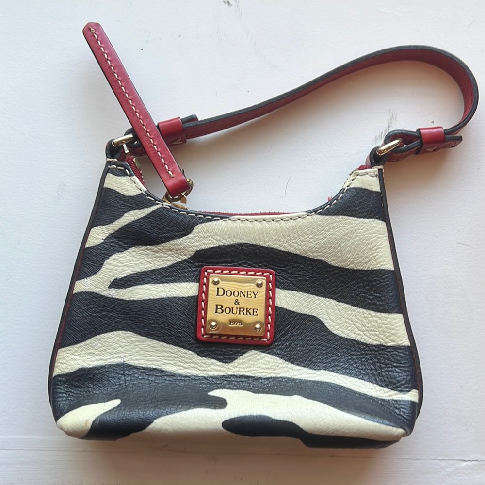 Dooney & Bourke adorable mini bag in zebra print with red accents